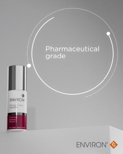 A sleek silver-topped bottle of environ focus care youth concentrated retinol serum with a white label and deep red band.