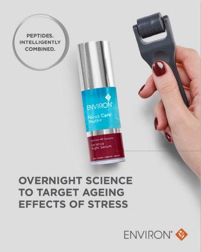Silver and blue environ focus care youth+ night serum bottle with a red label.
