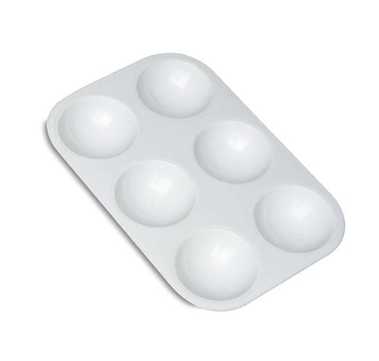 A rectangular white plastic artist palette features six circular wells for mixing and holding paint.