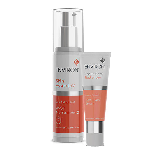 Environ Skin EssentiA AVST Moisturiser 2 and Focus Care Radiance+ Intense C-Boost Mela-Even Cream stand together against a white background.