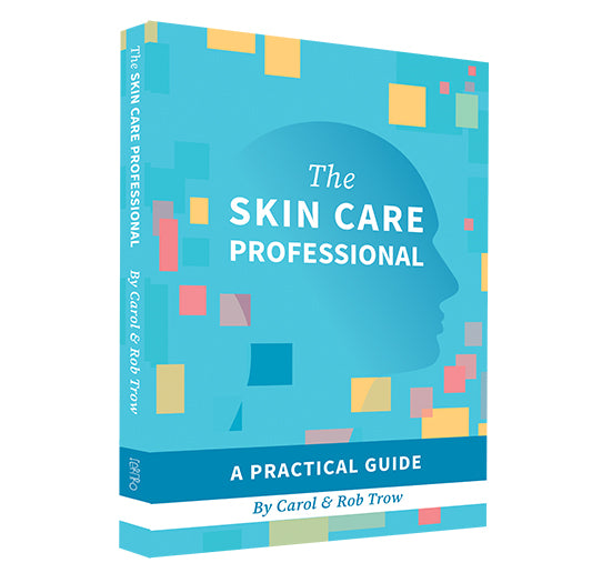 The book "The Skin Care Professional: A Practical Guide" by Carol &amp; Rob Trow features a blue cover with a human profile silhouette and colorful geometric squares.