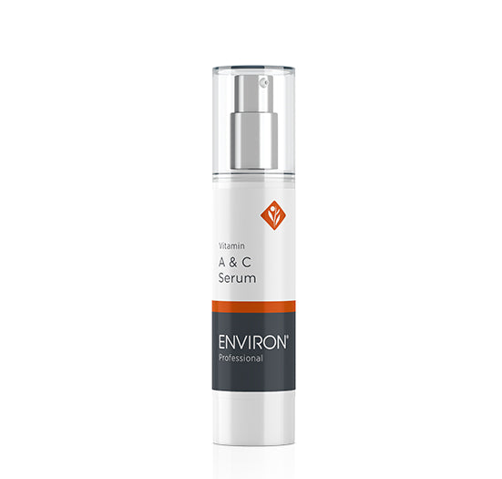 A bottle of Environ Professional Vitamin A & C Serum showcases its sleek design and clear pump dispenser.